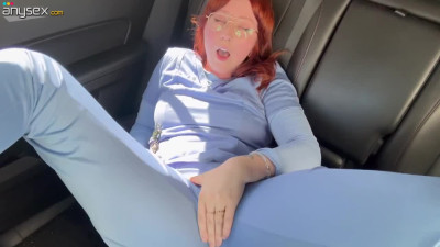 Nerdy redhead with a phat ass squirts in her own car