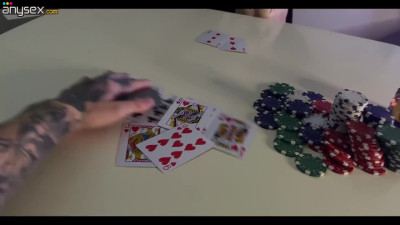 Russian slut looses a game of poker and has to lick his dick from over the desk