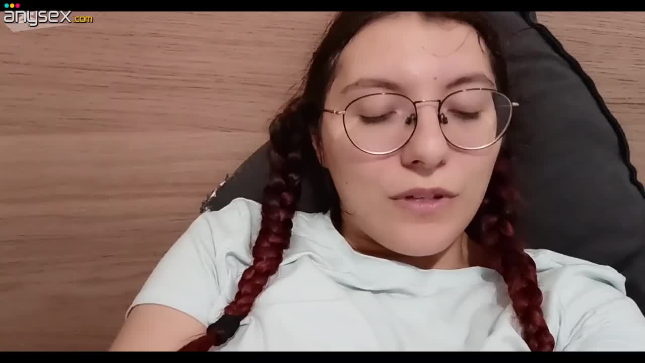 Adorable german teen wearing glasses caresses her awesome natural tits in front of acamera Free Porn Videos | ePornAny.