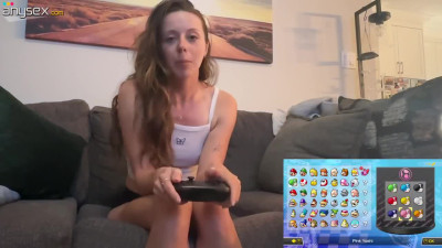 Cute gaming girl Nadia Foxx plays Mario Kart with a Lovence Vibrator